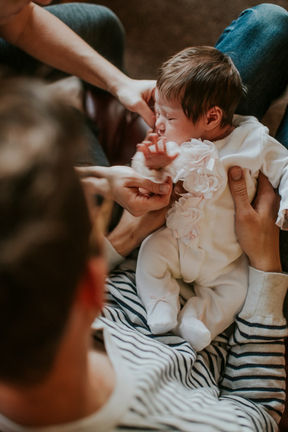 man carrying baby