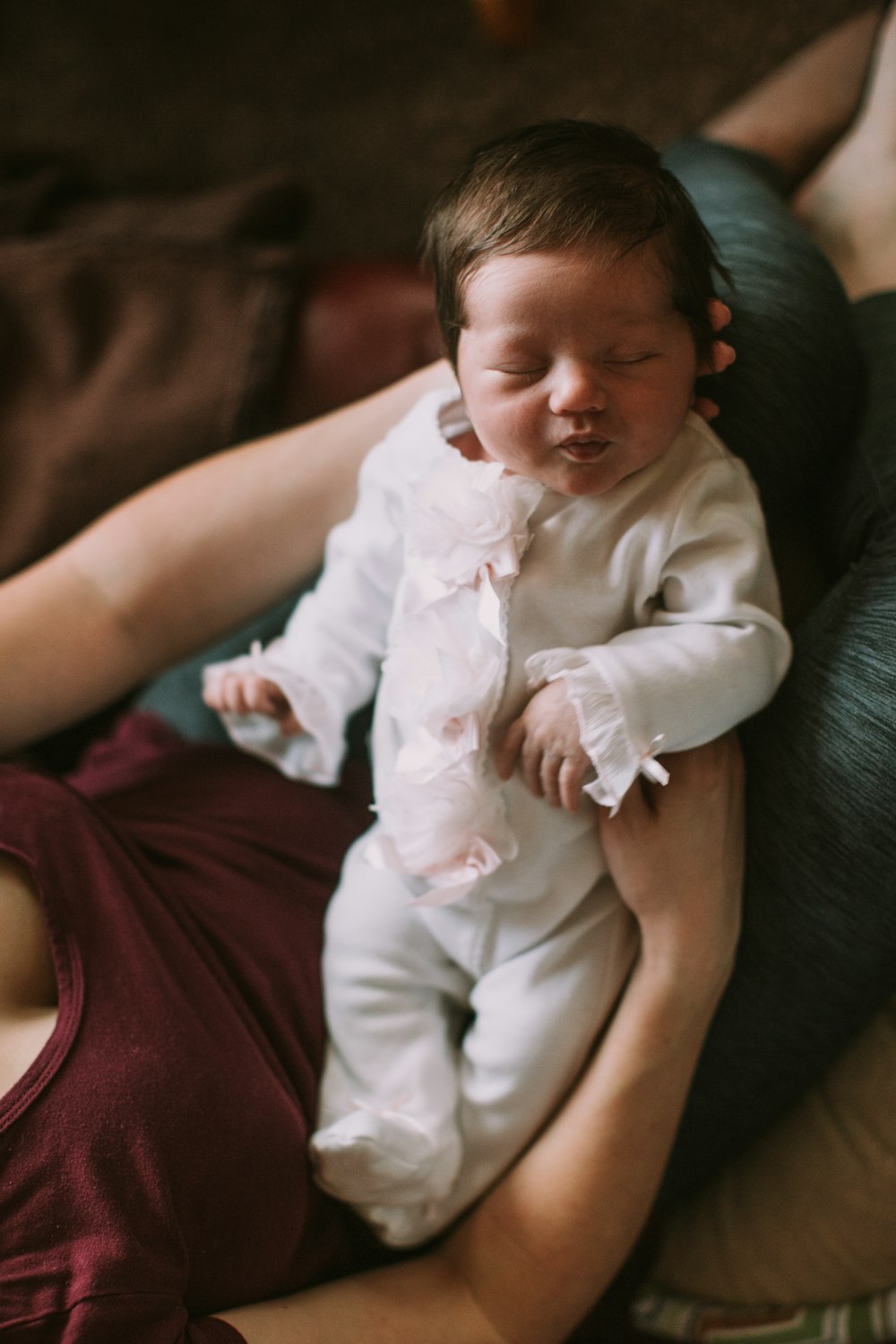 woman holding baby