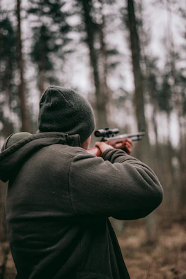 man using sniper rifle