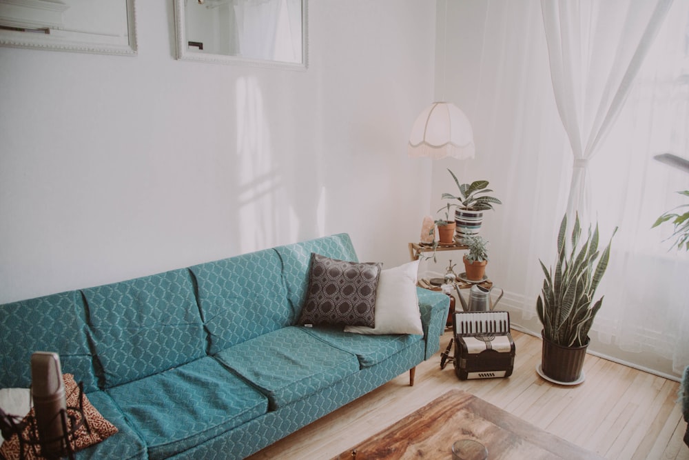 sofa beside accordion on floor