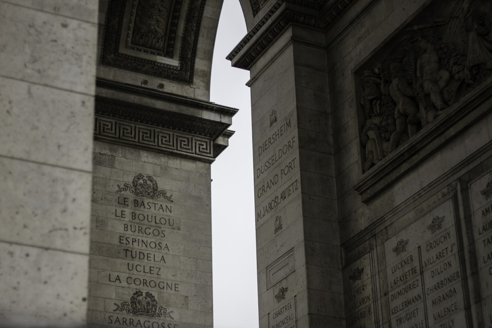 a couple of stone pillars sitting next to each other