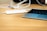 Close-up of a sleek portable charger on a wooden table.