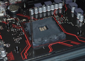 red and black computer motherboard