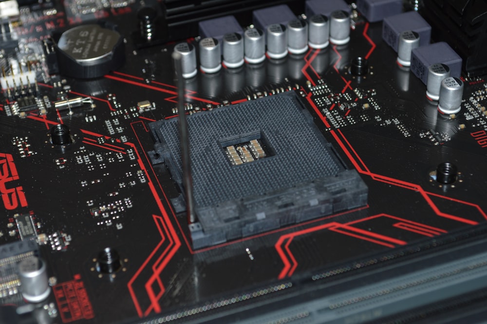 red and black computer motherboard