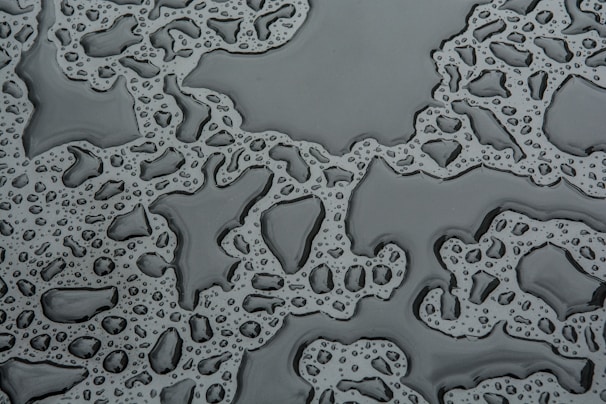 A before-and-after comparison of a surface exposed to water.