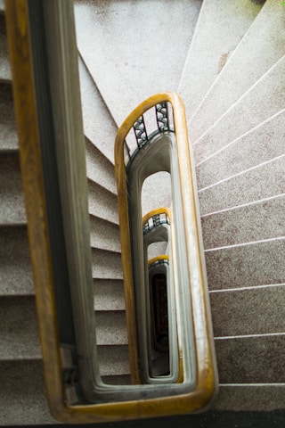 gray concrete spiral staircase
