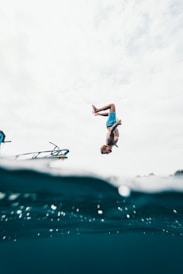 time lapse photography of man jumping at gili air by giligate