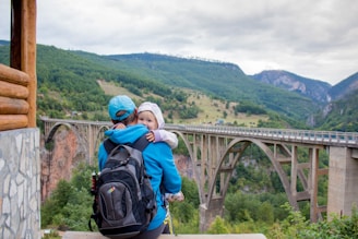 man wearing black and gray backpack