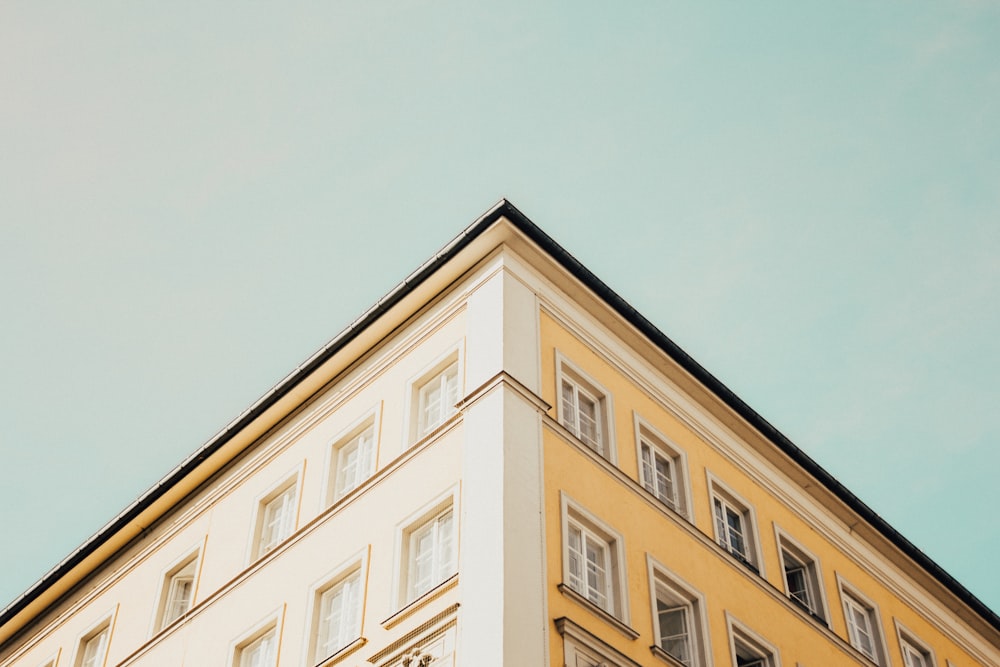 low-angle photography of building edges