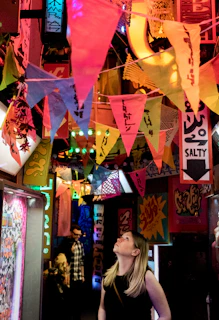 A vibrant event setup with banners and promotional materials created by brandnexa.