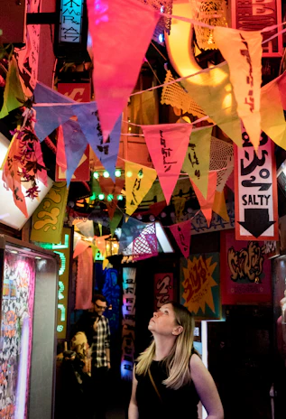 A vibrant event setup with banners and promotional materials created by brandnexa.