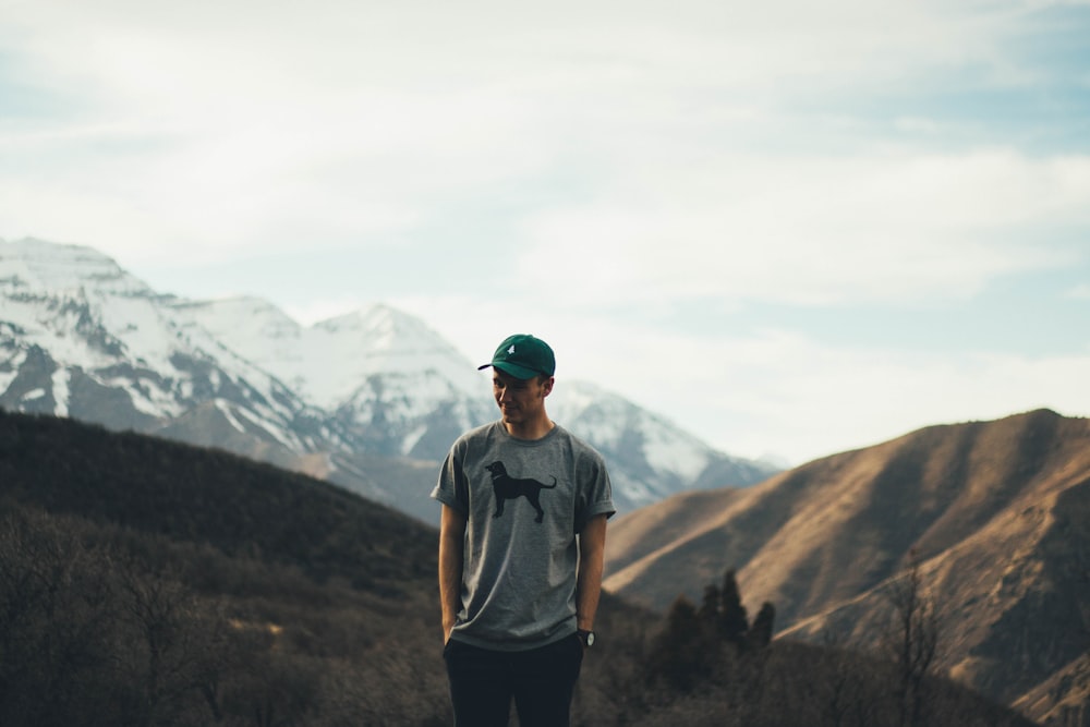 man standing on mountain range