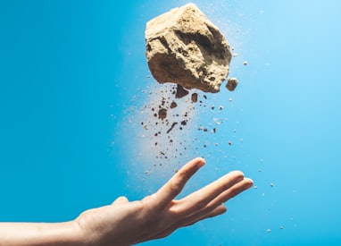 person throwing rock