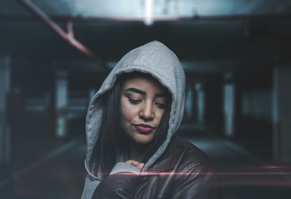 selective focus of woman wearing gray hoodie