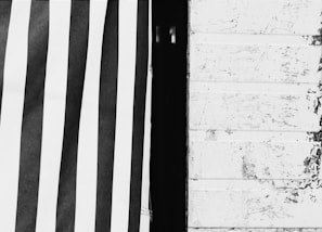 Black and white photo transformed with contrast and texture enhancements.