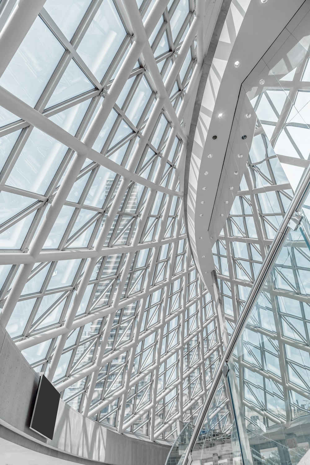 architectural photography of white spiral dome