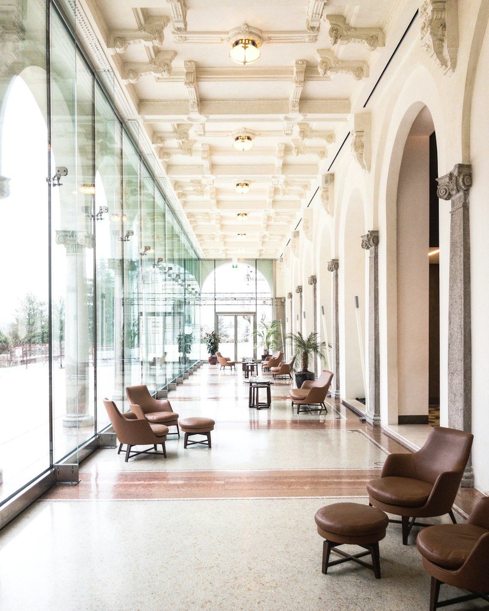 empty hallway beside glass wall