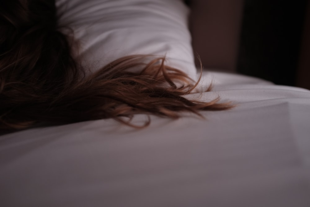 woman hair on blanket