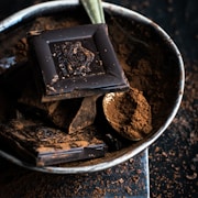 chocolate bar and powder in bowl