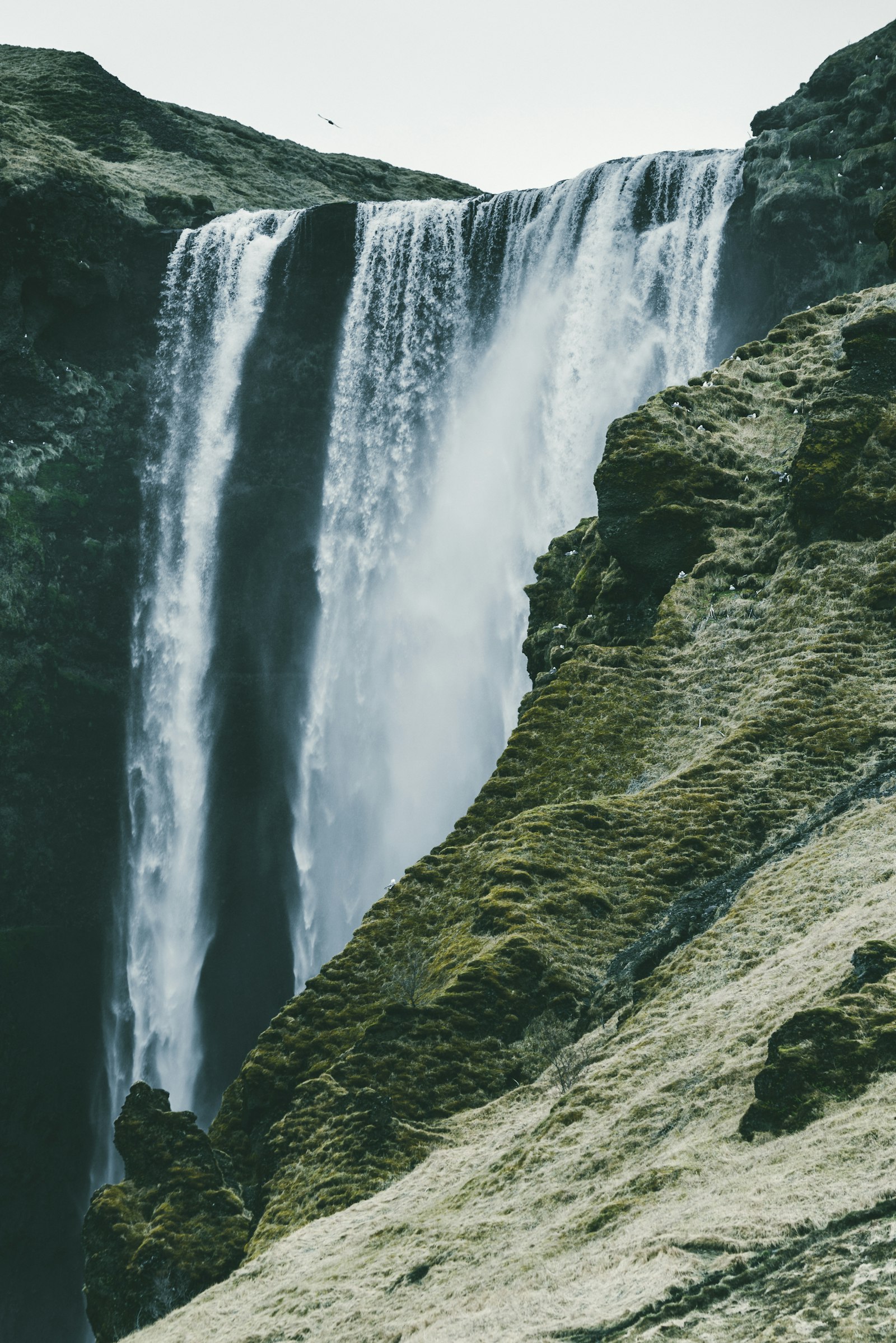 Nikon D600 + Nikon AF-S Nikkor 70-300mm F4.5-5.6G VR sample photo. Waterfalls near rock mountain photography