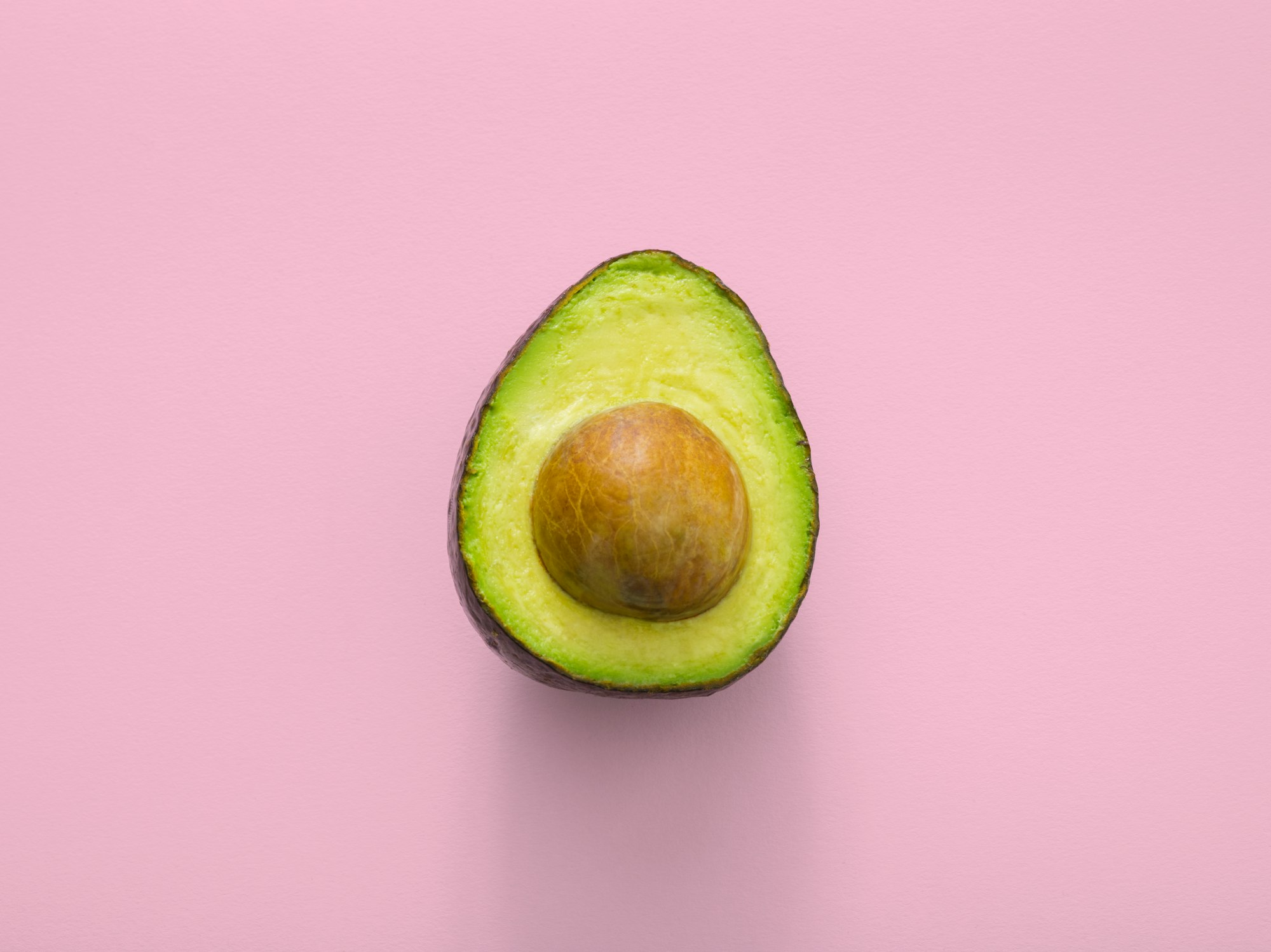 Avocado is a green rainbow food by www.thoughtcatalog.com for Unsplash