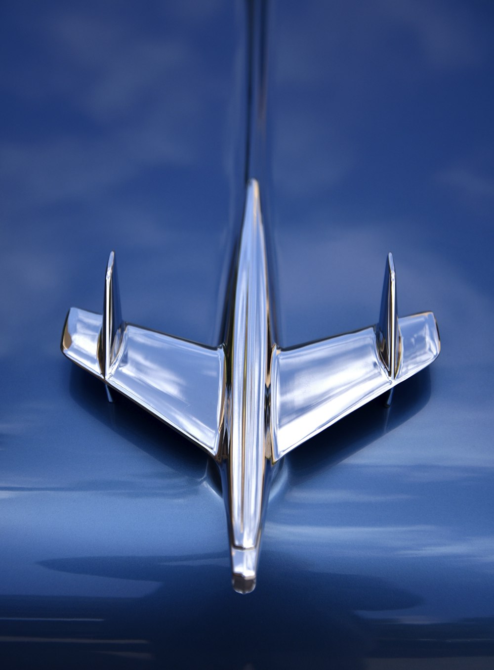silver car plane emblem