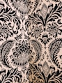 white and black damask textile