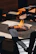 A warm outdoor fireplace surrounded by comfortable seating, showcasing expert masonry.