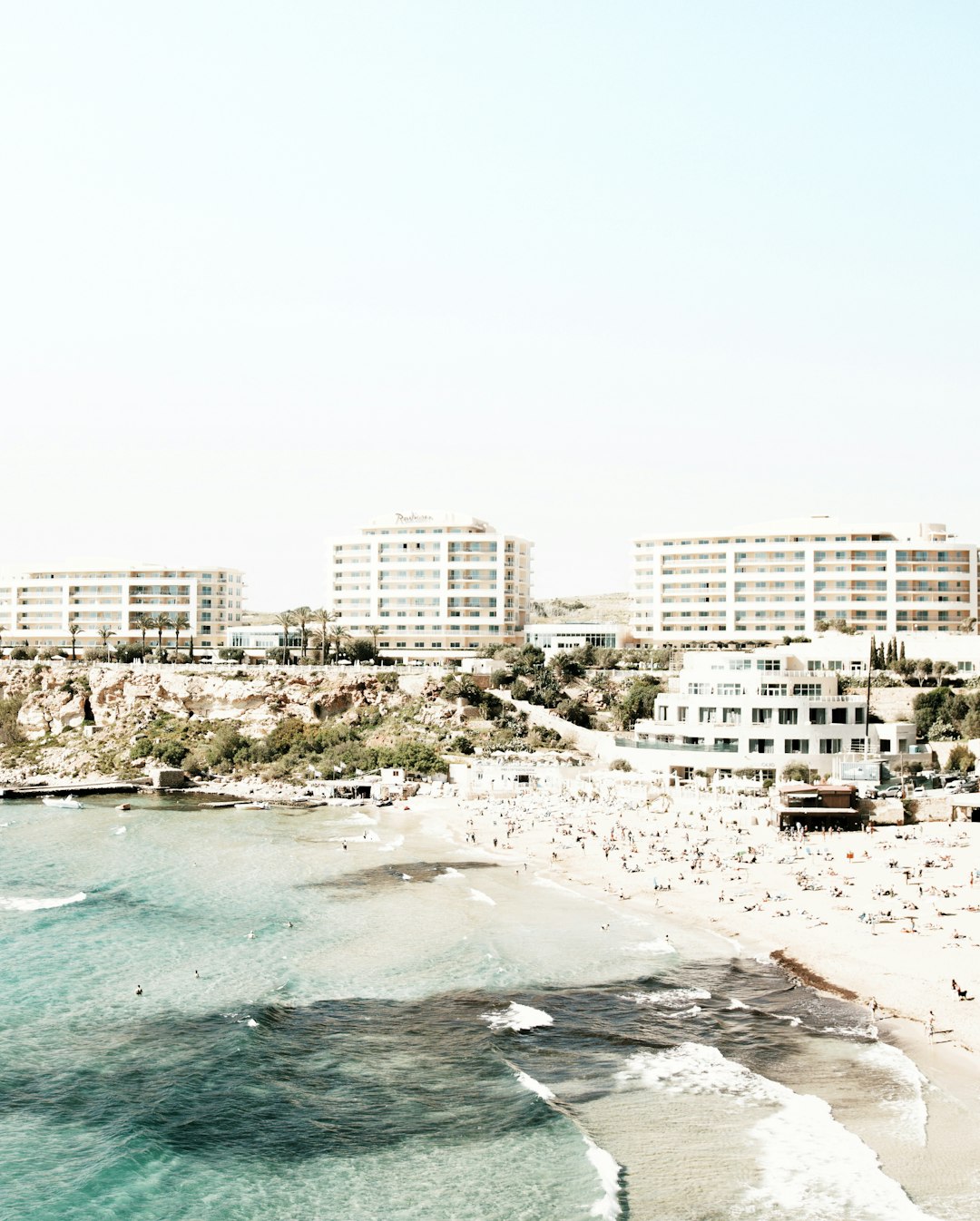 photo of Għajn Tuffieħa Coastal and oceanic landforms near Madliena Chapel