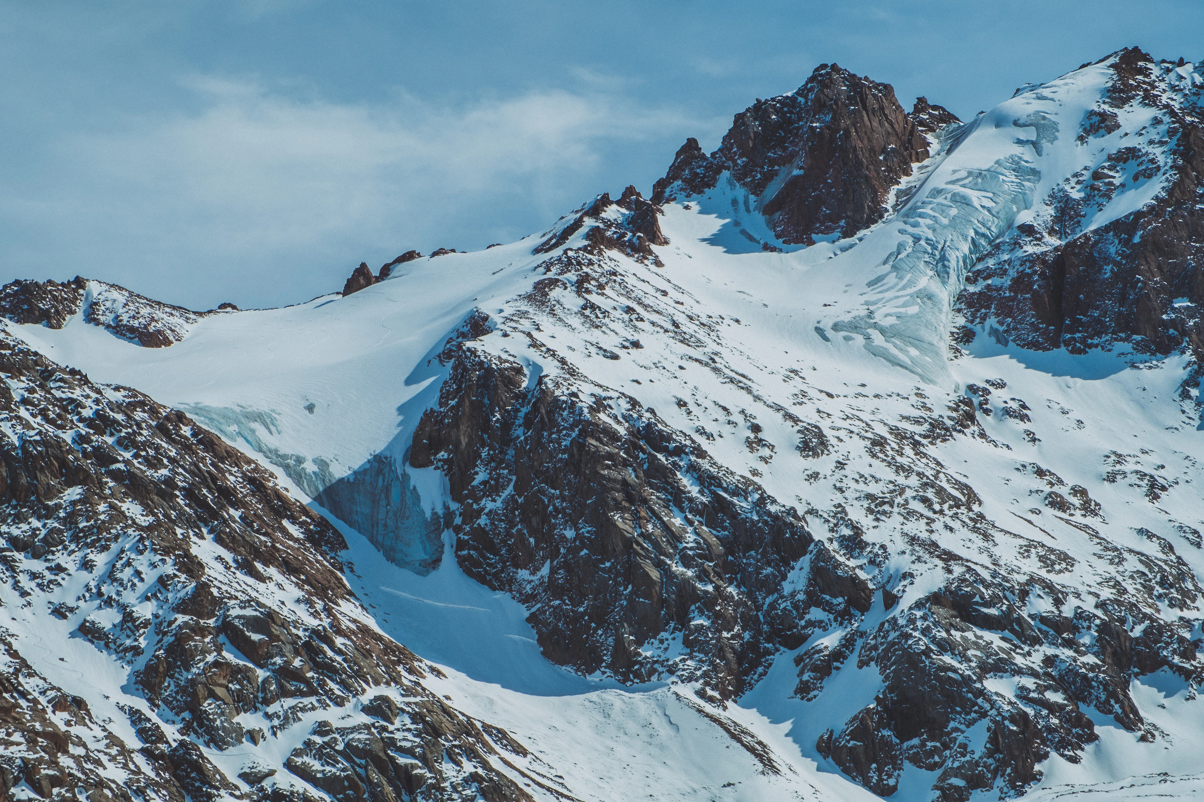 Jagged snow- and glacier-covered peaks of the Tian Shan mountains above Almaty.