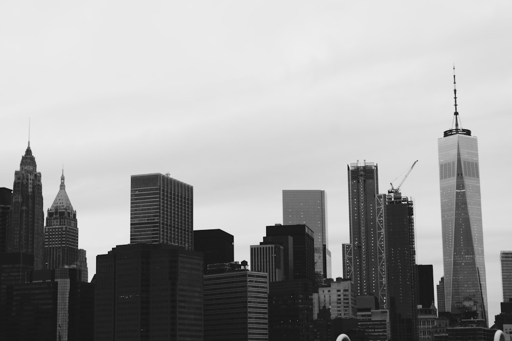 grayscale photo of high-rise buildings