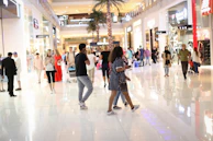 Manpower team coordinating logistics in a bustling shopping mall.