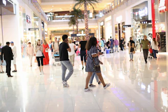 Manpower team coordinating logistics in a bustling shopping mall.