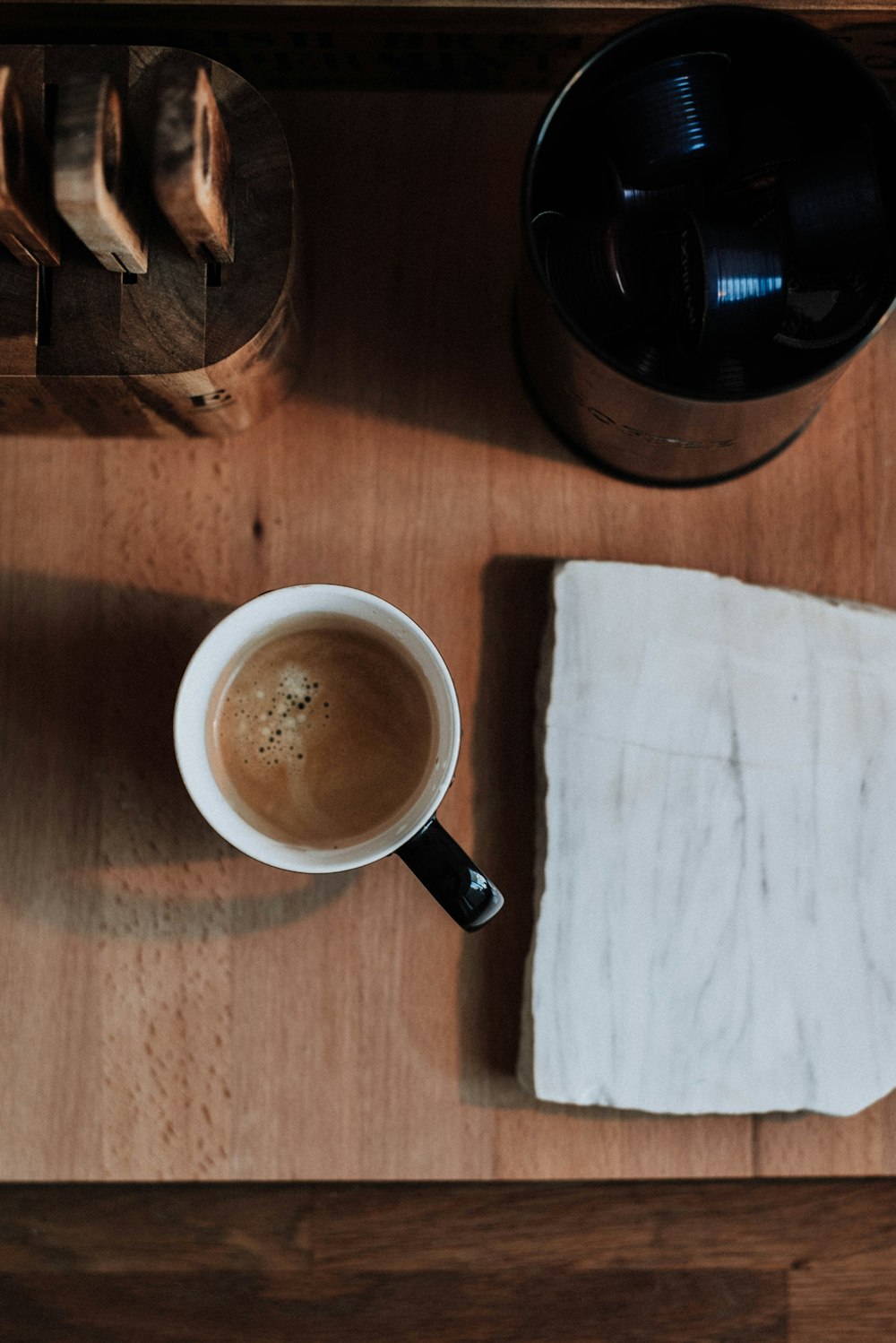 brown liquid on white ceramic mug