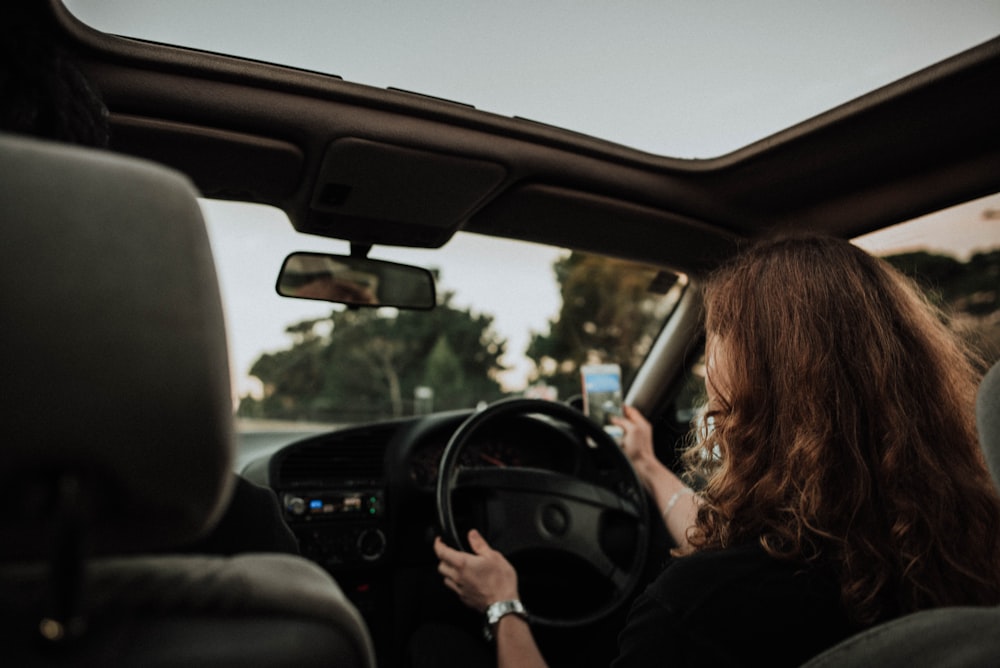 woman inside car driving