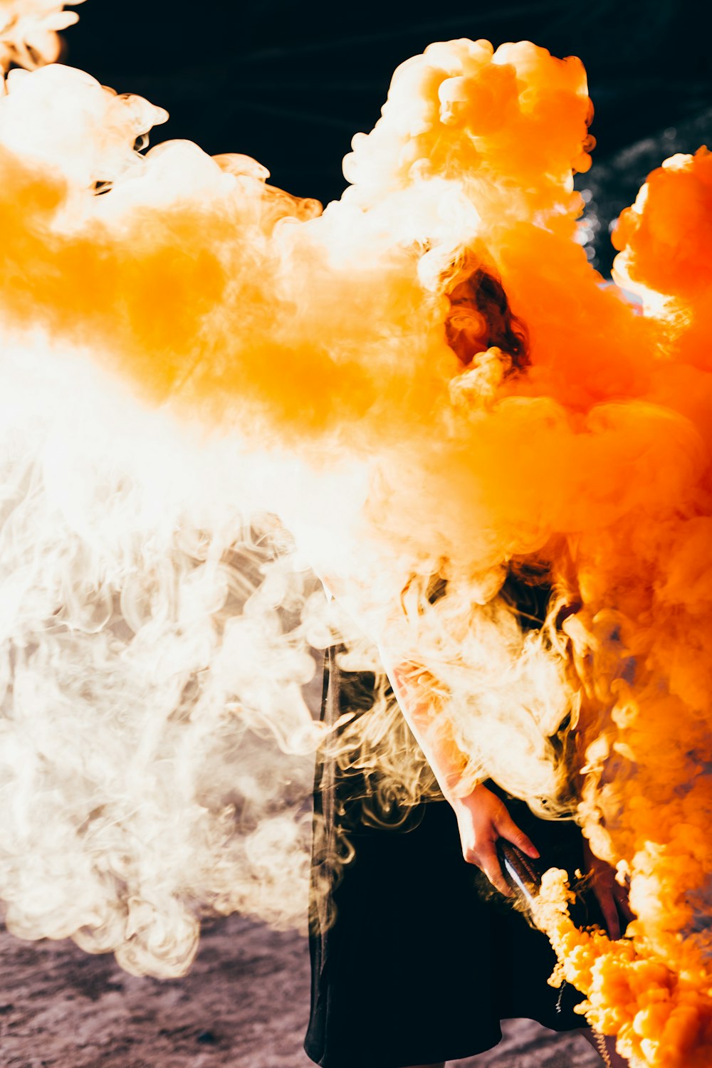 person holding bomb smoke