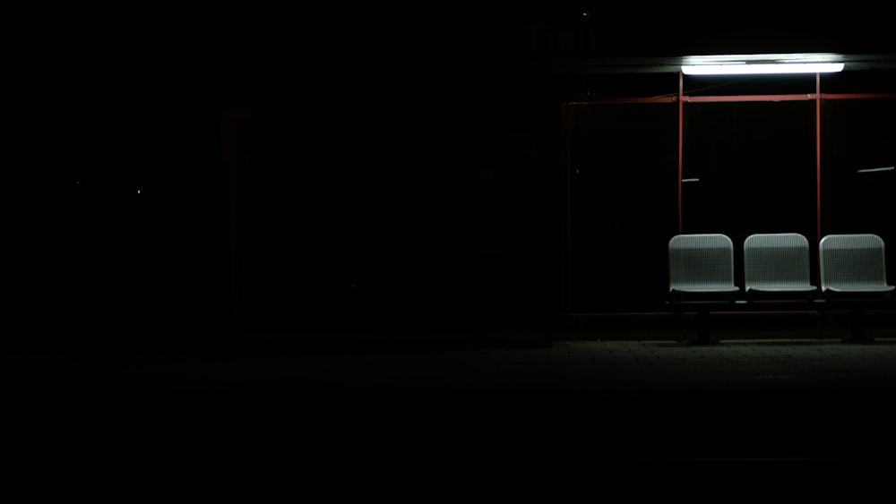 white and red waiting shed