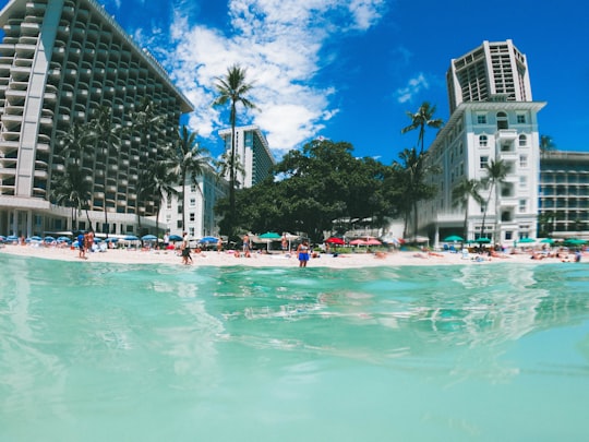 fish eye lens shot of resort pool and buildings in Waikīkī United States