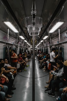 people sitting inside train