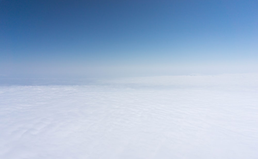 white clouds under clear sky