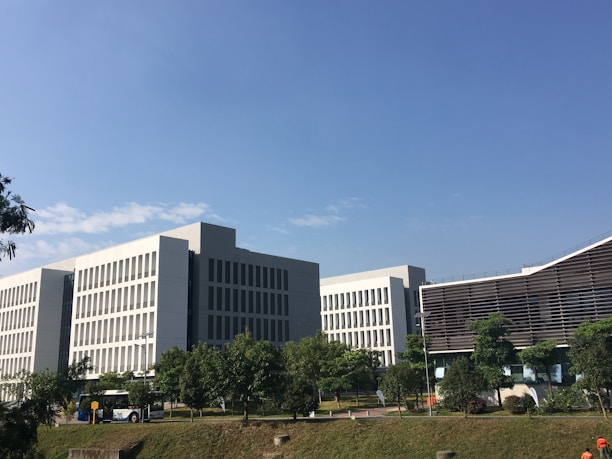 Well-maintained commercial tech park with lush greenery and modern buildings.