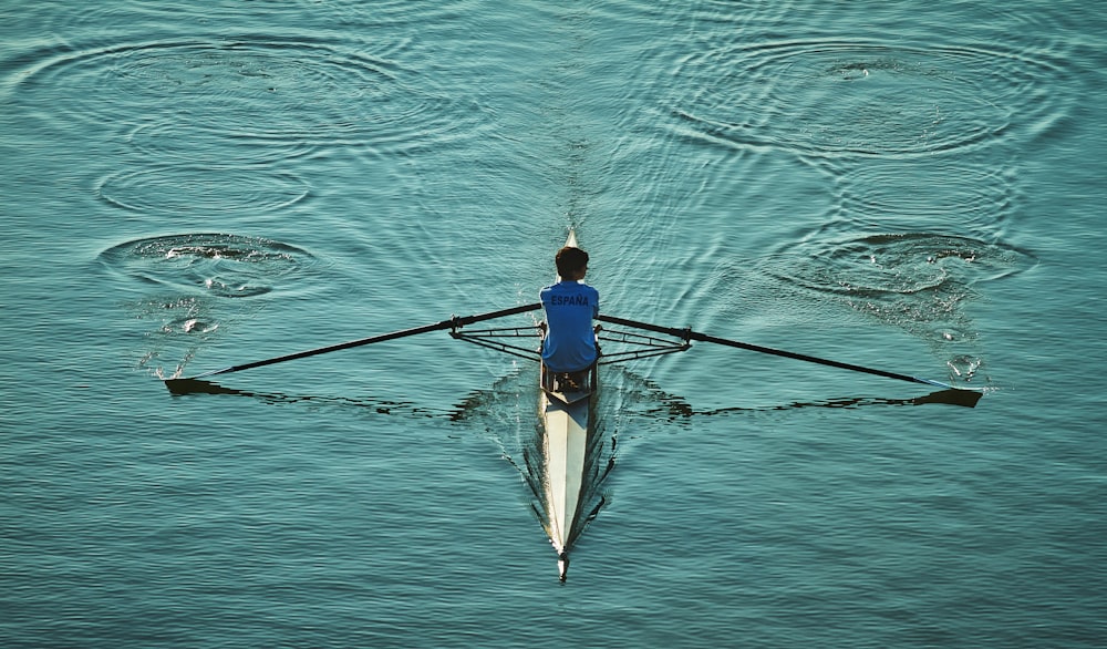 person sailing on body of water