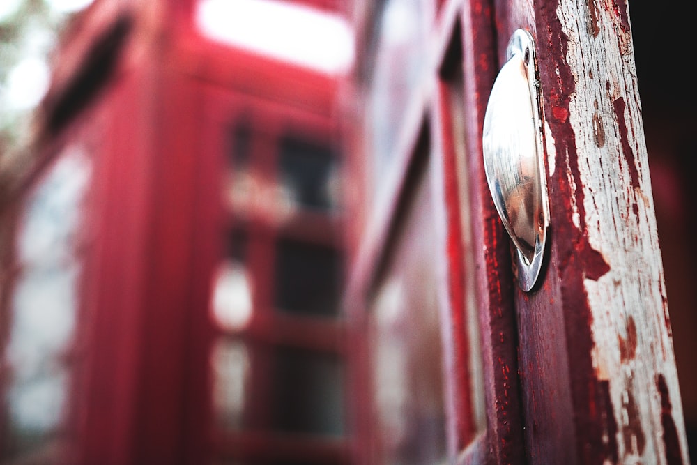 selective focus photography of telephone booth
