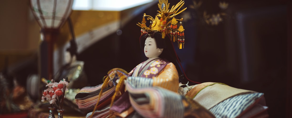 Geisha doll on table