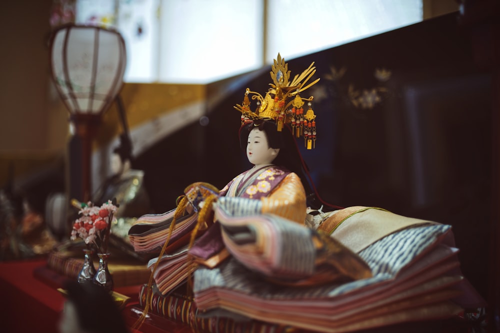 Geisha doll on table