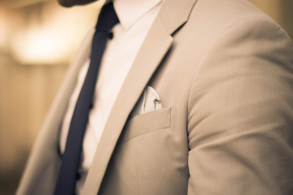 man wearing beige coat