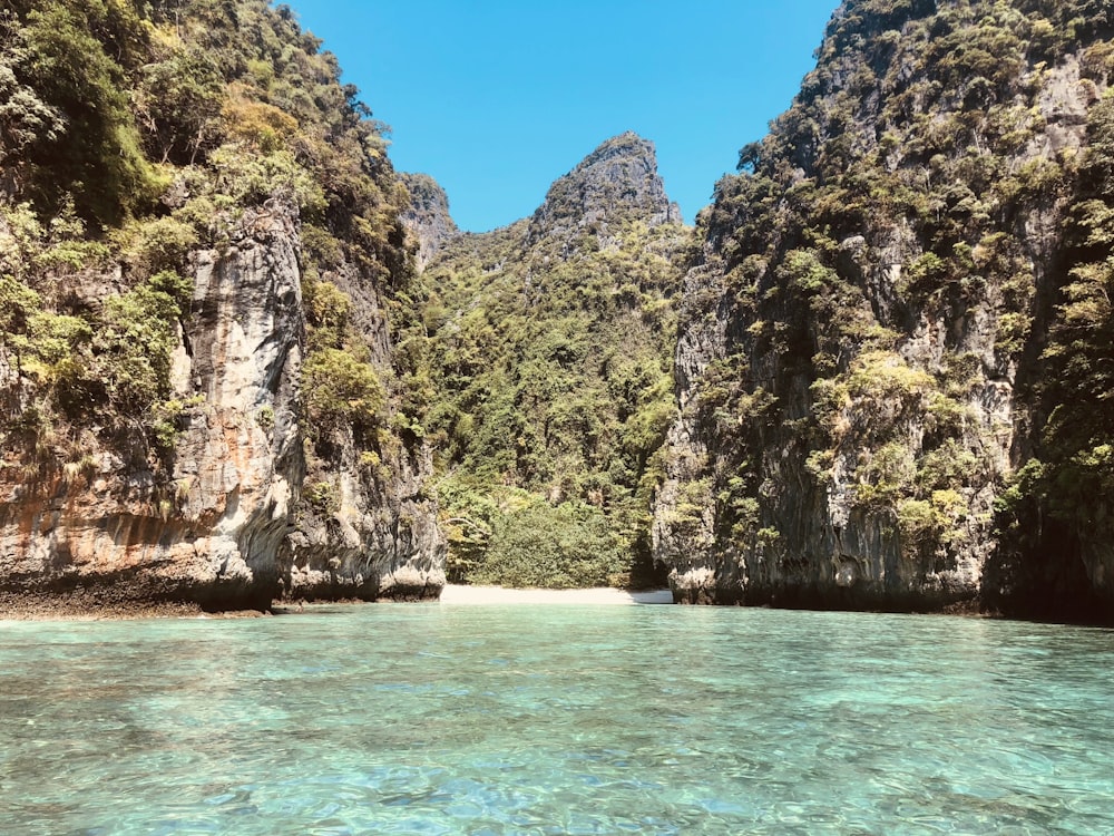 mountains near body of water