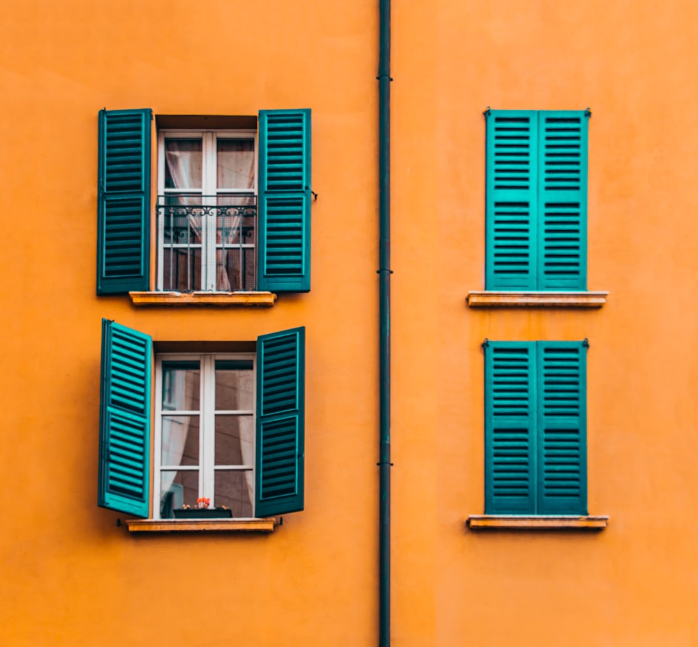 orange and green painted building