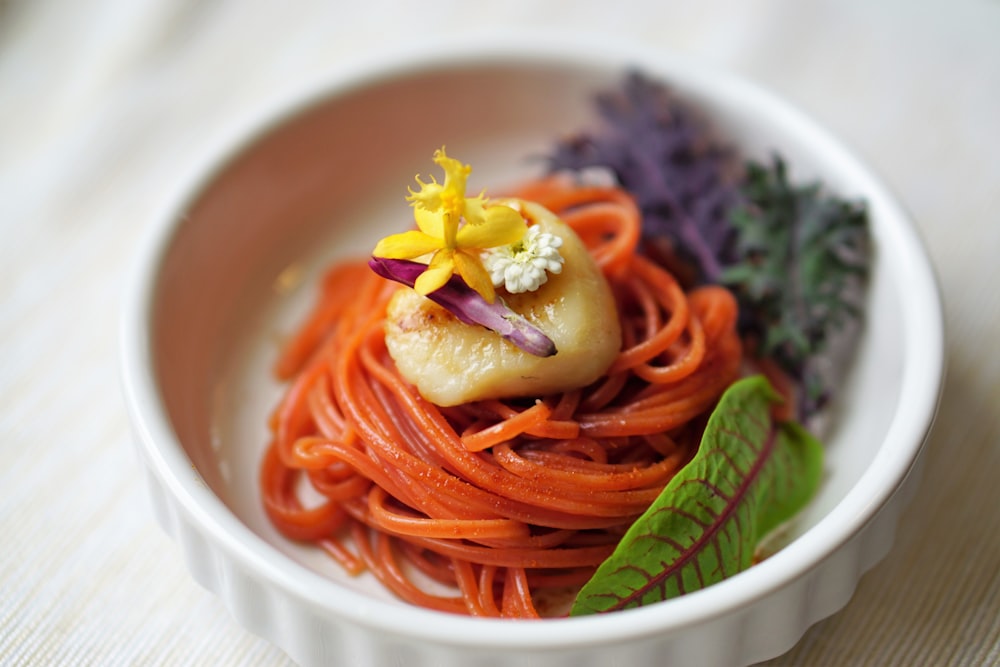 close up photo of pasta with toppings