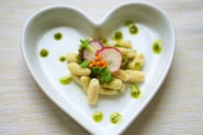 pasta dish on white bowl